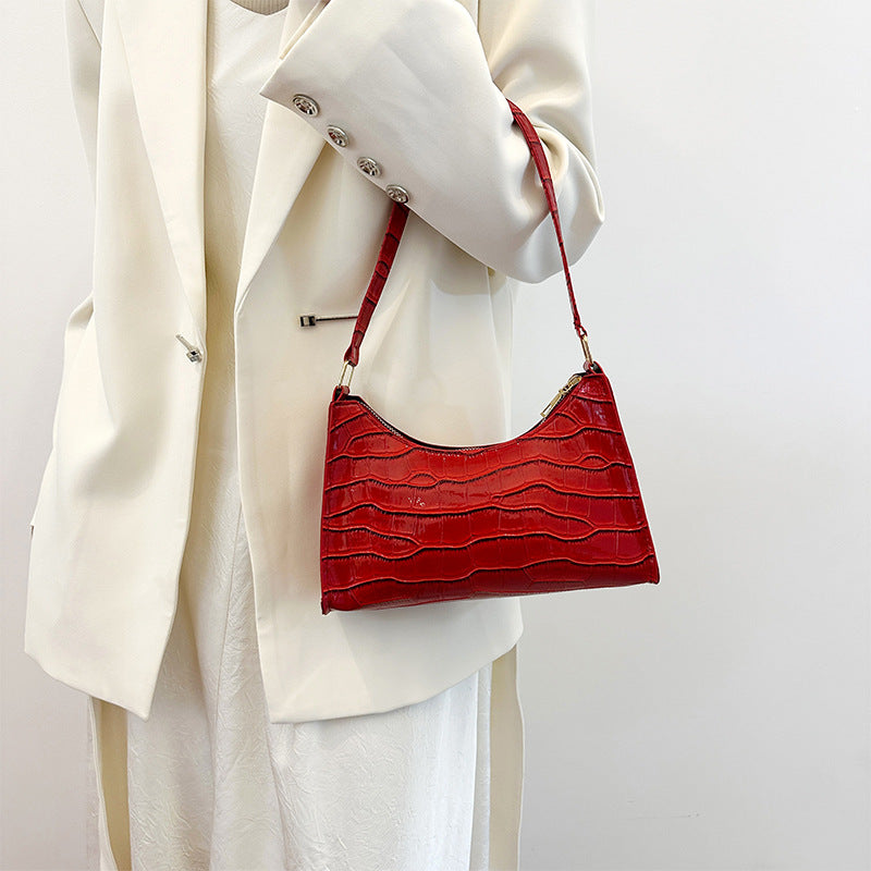 Olivia - Kiiltävä Nahkalaukku